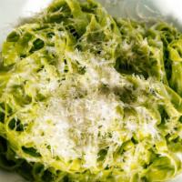 House Made Fettuccine Alfredo · house made spinach fettuccine, parmesan, cream