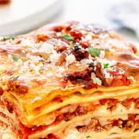 Baked Lasagna · house made pasta, classic meat sauce, ricotta, mozzarella, parmesan