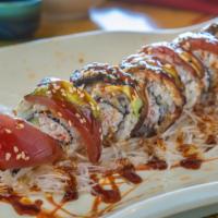 R1-dragon Roll · Inside: crab meat salad, cucumber. outside: grilled unagi, fresh tuna, avocado and unagi sau...