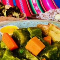 Seco de Pollo: Green Herb Chicken · Free range chicken in Kabocha-Coriander Sauce, yucca, yams. *Comes with Andean Rice (rice wi...