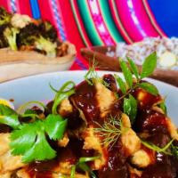 Vegan Chickenless Chicken · Vegan chickenless chicken with a delicious red chilli shitake sauce​. *Comes with Andean Ric...