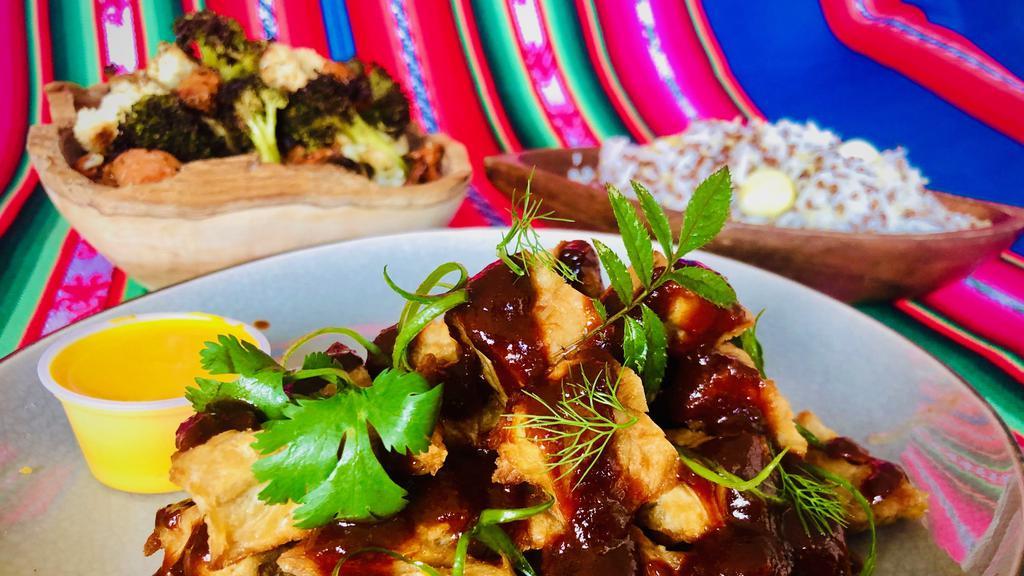 Vegan Chickenless Chicken · Vegan chickenless chicken with a delicious red chilli shitake sauce​. *Comes with Andean Rice (rice with quinoa and heirloom Andean Corn) and Herb Roasted Veggies and Creamy Vegan Gluten Free Sauce. ​(Vegan · Gluten​Free · Nut​Free)