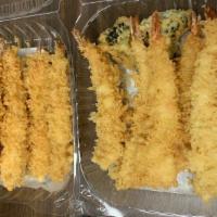 Shrimp Tempura Roll · 2 shrimp tempura, avo, cream cheese w/ eel sauce