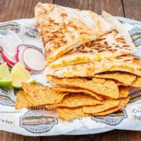 1. Cheese Only · Flour Tortilla, Cheese,  Radish, Limes & Salsas, with a side of Corn Tortilla Chips.