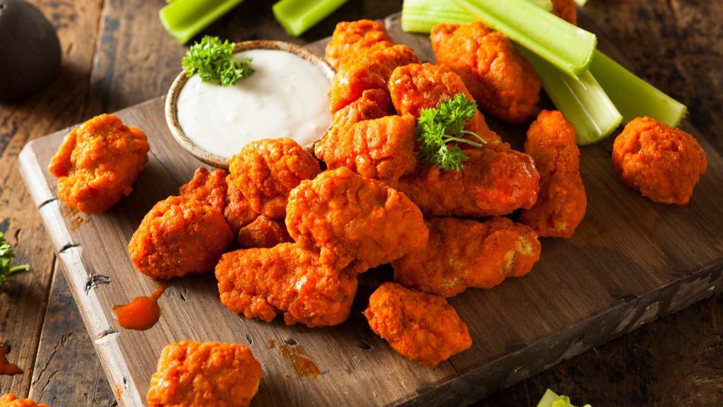 Boneless Buffalo Wings · Love wings but not the bone? We've got you covered. Try our crispy deep-fried boneless wings tossed in our spicy Buffalo sauce.