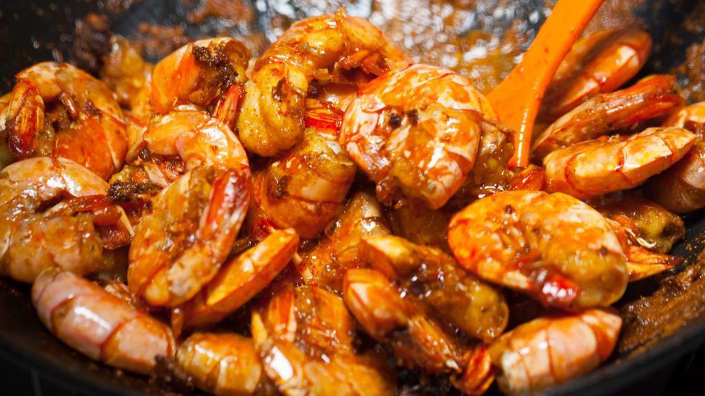 Honey Butter Fried Shrimp · Freshly battered Cajun seasoned shrimp, deep-fried and served hot and crispy.