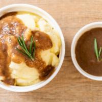 Mashed Potatoes & Gravy · Creamy potatoes with a serving of homemade gravy.
