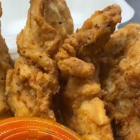Chicken tenders · Juicy fried chicken tenders. With your choice of dipping sauce.