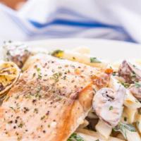 Think About Salmon · Salmon, fresh spinach , mushroom cooked in a creamy Alfredo sauce with your choice of pasta.