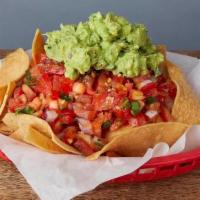 CHIPS, SALSA & GUACAMOLE · Our chips, pico de pallo, and Hass avocado guacamole