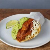 BAJA FISH TACO · One taco with beer battered fish in soft corn tortillas with cilantro, cabbage, red onions, ...