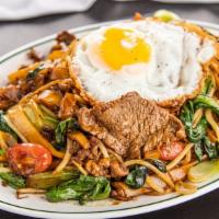 Drunken Noodle · Thick rice noodle stir fried with beef, cherry tomatoes, bok choy, bean sprouts, and basil. ...