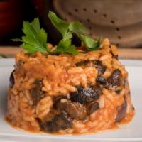 Risotto Boscaiola -Vegan · Italian Carnaroli rice with lightly spicy tomato sauce with mushrooms and olives.