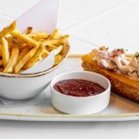 Chilled Maine Lobster Roll · Old bay French fries, lemon aïoli, chives, and trap caught near Casco Bay, Maine.