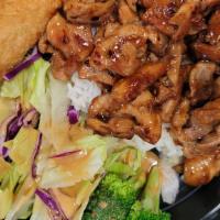 Teriyaki Chicken Over Rice · Comes with Egg Roll and side salad.