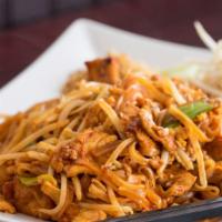 Pad Thai · Pan-fried thin rice noodles with egg, tofu, bean sprouts, and ground peanut in a delicately ...