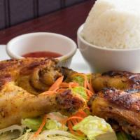 BBQ Chicken · Grilled marinated chicken in our special Thai herbs with sweet and sour sauce. Served with r...