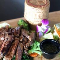 BBQ Beef · Grilled beef with Thai style spicy lime sauce. Served with rice.