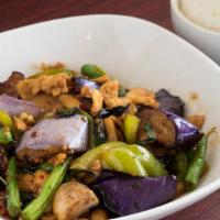 Spicy Eggplant · Sauteed eggplant, mushroom, green beans, bell pepper and basil in garlic chili sauce. Served...