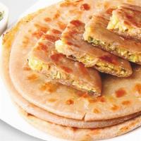 Paneer Paratha · 2 whole wheat flatbread stuffed with cottage cheese, spices & herbs, served with a choice of...
