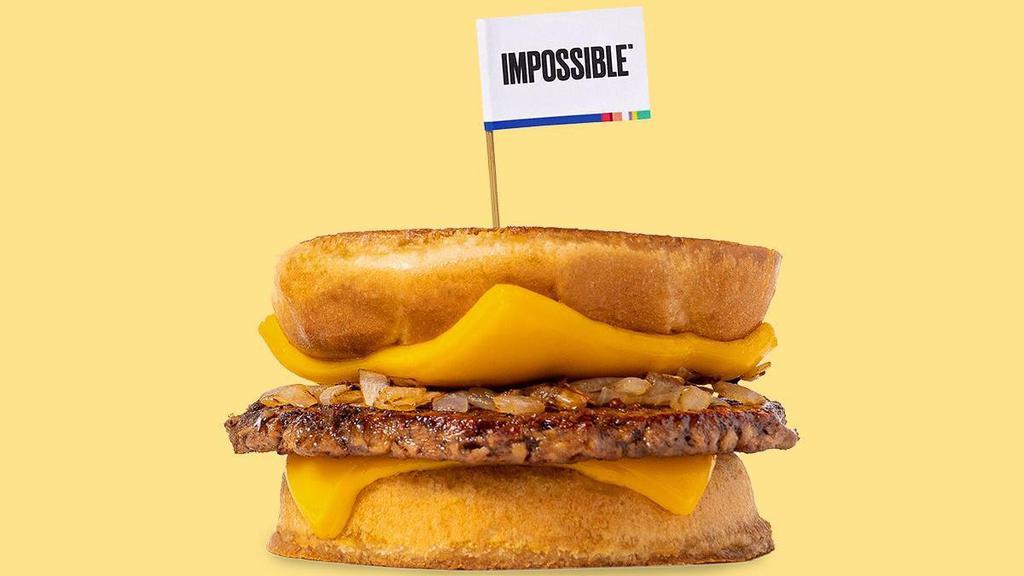Impossible™ Karl'S Deluxe · A patty melt served Karl’s Style with a crispy seasoned Impossible™ patty, caramelized onions and cheese on a toasty inverted bun