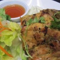 26. Gai Young · Chicken roasted with a special blend of Thai spices served with sweet-n-sour sauce.
