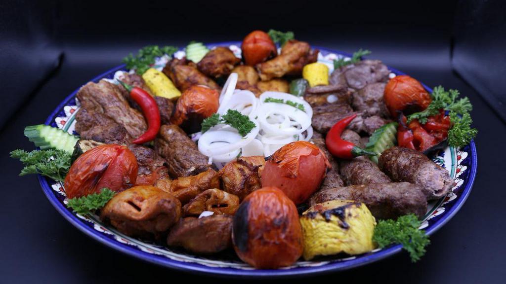 Super Dastarkhan Plate · This particular dish comes with any five meat kebabs and two veggie kebabs, additional salad, rice, sauce, onions, tea, and bread are included.
Choose any 5 meat kebabs!