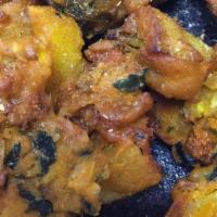 Vegetable Pakora · Spicy. Vegetarian. Assorted vegetables dipped in gram flour deep-fried.