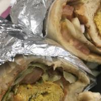 Chicken Boti Kabab Wrap · Comes with lettuce, tomatoes, mayonnaise, and chutney.