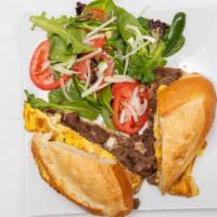 Steak Sandwich · Steak cooked with onion and served with fried egg, lettuce, green peppers and tomatoes with ...