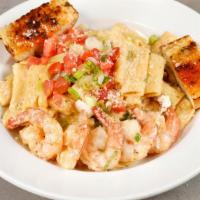 California Pasta · Plump juicy tiger prawns sautéed with Cajun spices, green onions and mushrooms. Tossed with ...