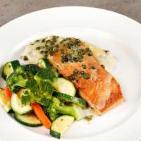 Grilled Salmon Piccata · Grilled salmon topped with lemon wine sauce and capers. Served with garlic mashed potatoes a...