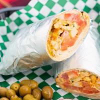 Chicken Shawarma Wrap · Chicken, tomato, pickles, garlic and yogurt sauce.