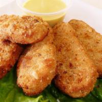 Crispy Nuggets · Soy protein nuggets with house special sauce.