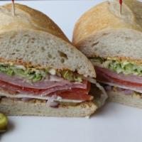 16. Italian Sandwich · Mortadella, salami and pepperoni. Cajun mayo, Yellow mustard, lettuce, tomato, red onion and...