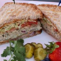 11. Tuna Salad Sandwich · Mayo, Yellow mustard, lettuce, tomato, red onion and pickles.