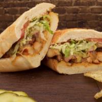 12. Grilled Chicken · Cajun mayo, Yellow mustard, lettuce, tomato, red onion, and pickles.