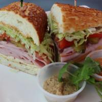 2. Black Forest Ham Sandwich · Cajun mayo, Yellow mustard, lettuce, tomato, red onion and pickles.
