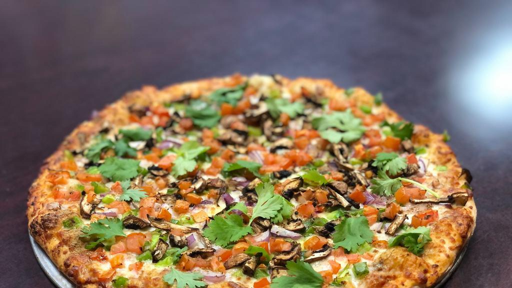 Veggie Curry Pizza · Curry sauce, mozzarella, tomatoes, red onions, mushrooms, bell-peppers and cilantro.