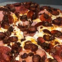 Meat Lovers Pizza · Pepperoni, ham, sausages, salami, linguica, bacon mozzarella cheese and tomato sauce.
