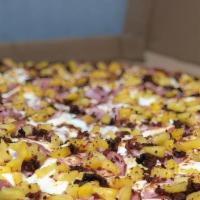 Classic Hawaiian Pizza · Ham, bacon, pineapple, mozzarella, cheese, tomato sauce.