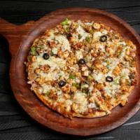 Apna Garlic Paneer Pizza · Garlic paneer. White sauce, pineapple, jalapenos, tomatoes, red onions, paneer, and mozzarel...