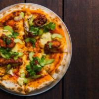 Apna Tandoori Pizza · Tandoori sauce, red onions, bell peppers, sweet corn, chicken, mozzarella cheese topped with...