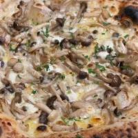 Fungo Pizza · Wild Mushrooms, goat cheese, fontina cheese, thyme, truffle oil, Italian chilies