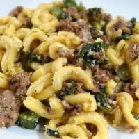 Garganelli · Homemade Curly pasta with sausage, broccolini, Italian chilies, pecorino sardo cheese