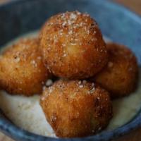 Croquette · Homemade Potato croquette with Gruyere cheese, Parmesan cheese, leeks,  parsley, . served wi...