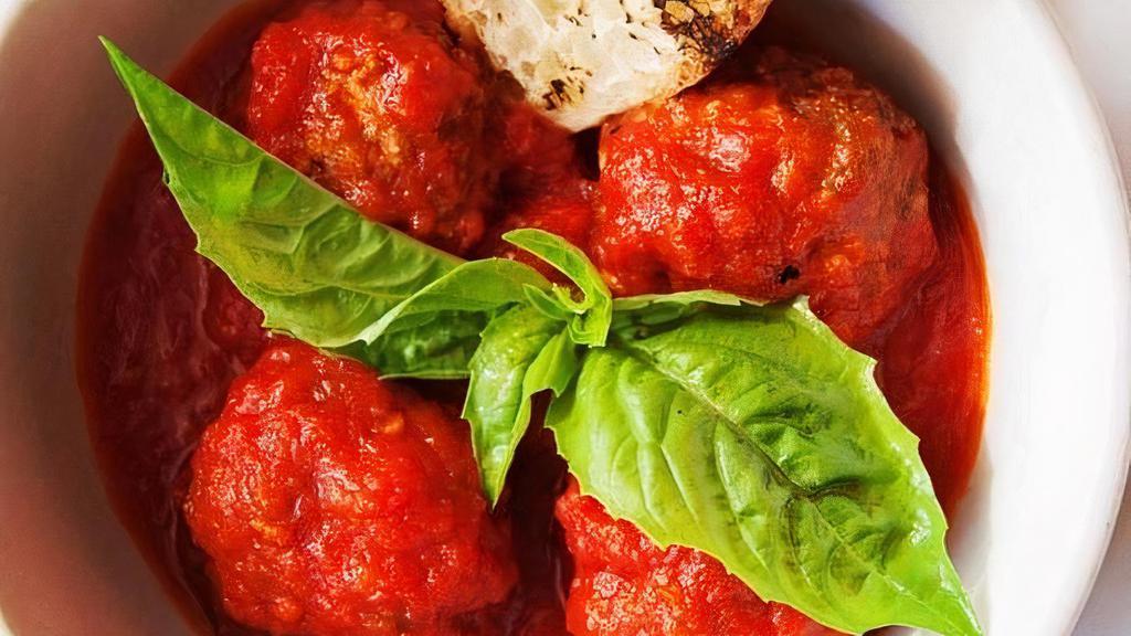 Polpettine · Neapolitan style meatballs (beef, sausage). in a spicy tomato sauce, . Served with grilled bread