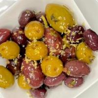 Olives Plate · Sauteed Assorted Mediterranean olives . with herbs and lemon zest