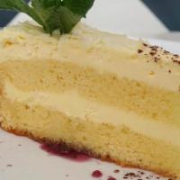 Lemon Cake · A combination of Sicilian lemon infused. sponge cake and italian mascarpone. topped with Eur...