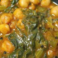Sag Chana · Vegan. Garbanzo beans, and spinach, the perfect trio with authentic Indian spices.